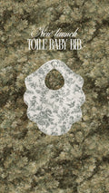 Green toile bib